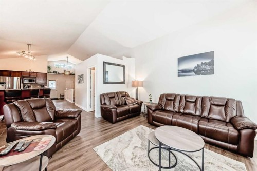 187 Hawkmere View, Chestermere, AB - Indoor Photo Showing Living Room