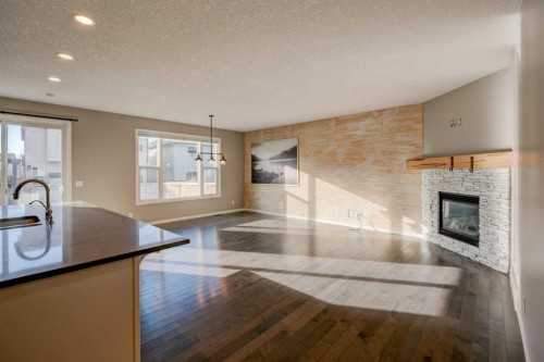 2016 Brightoncrest Green Se, Calgary, AB - Indoor With Fireplace