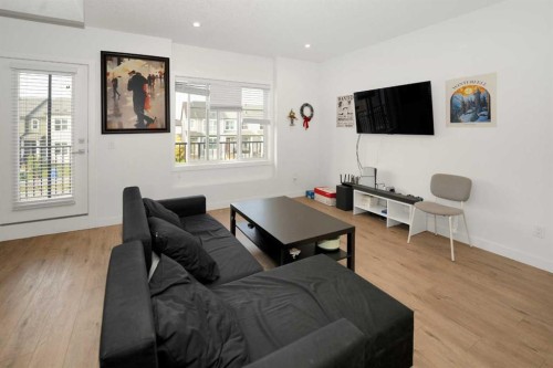 633 Savanna Boulevard Ne, Calgary, AB - Indoor Photo Showing Living Room