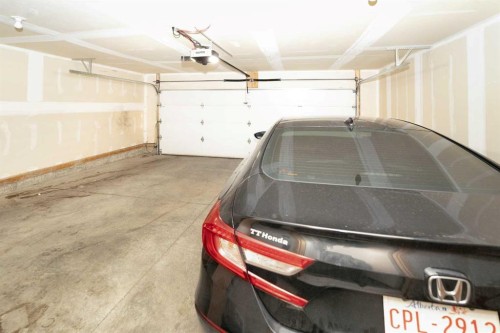 633 Savanna Boulevard Ne, Calgary, AB - Indoor Photo Showing Garage