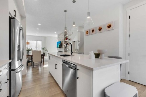 247 Greenbriar Common Nw, Calgary, AB - Indoor Photo Showing Kitchen With Stainless Steel Kitchen With Upgraded Kitchen