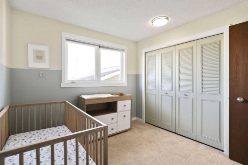 220 Scenic Way Nw, Calgary, AB - Indoor Photo Showing Bedroom