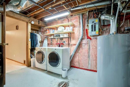 220 Scenic Way Nw, Calgary, AB - Indoor Photo Showing Laundry Room