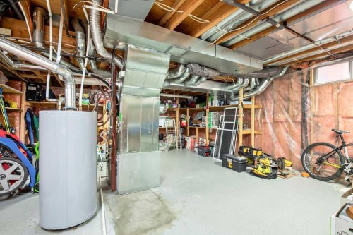 220 Scenic Way Nw, Calgary, AB - Indoor Photo Showing Basement