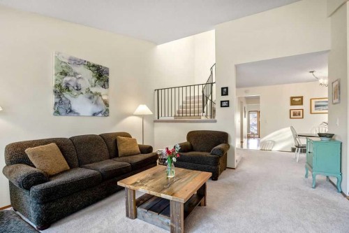 220 Scenic Way Nw, Calgary, AB - Indoor Photo Showing Living Room