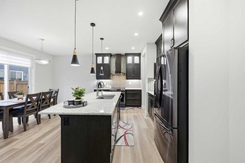 228 Carringham Road, Calgary, AB - Indoor Photo Showing Kitchen With Upgraded Kitchen