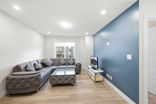228 Carringham Road, Calgary, AB - Indoor Photo Showing Living Room
