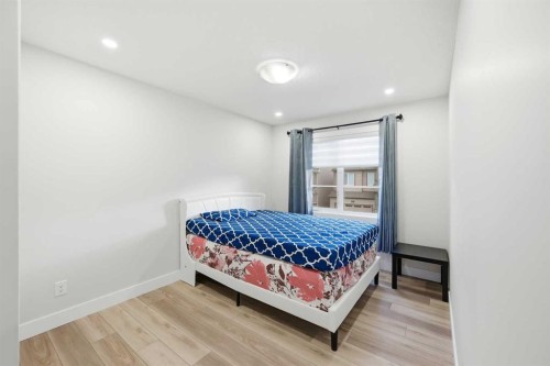 228 Carringham Road, Calgary, AB - Indoor Photo Showing Bedroom