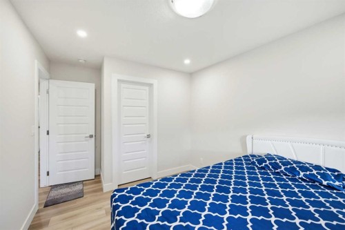 228 Carringham Road, Calgary, AB - Indoor Photo Showing Bedroom