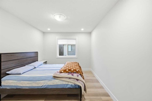 228 Carringham Road, Calgary, AB - Indoor Photo Showing Bedroom