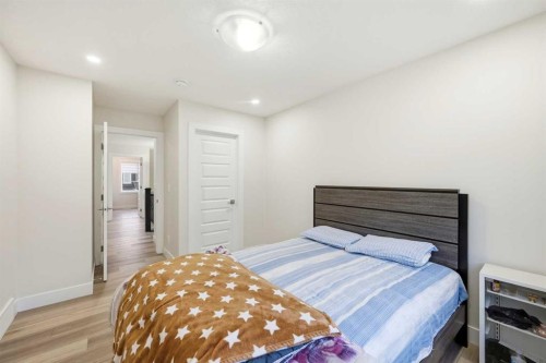 228 Carringham Road, Calgary, AB - Indoor Photo Showing Bedroom