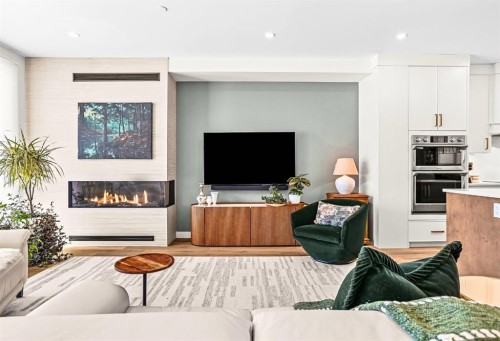 1-1202 2 Avenue, Canmore, AB - Indoor Photo Showing Living Room With Fireplace
