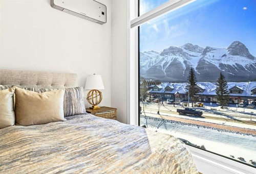 1-1202 2 Avenue, Canmore, AB - Indoor Photo Showing Bedroom