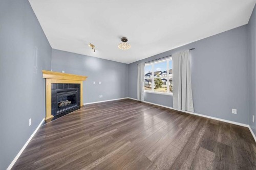 83 Tarington Way Ne, Calgary, AB - Indoor With Fireplace