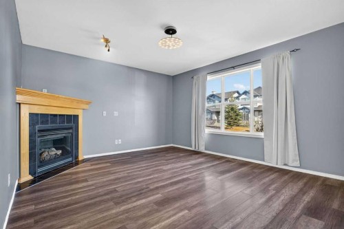 83 Tarington Way Ne, Calgary, AB - Indoor With Fireplace