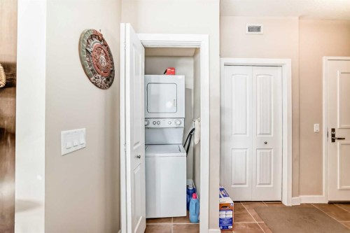 206-1005B Westmount Drive, Strathmore, AB - Indoor Photo Showing Laundry Room