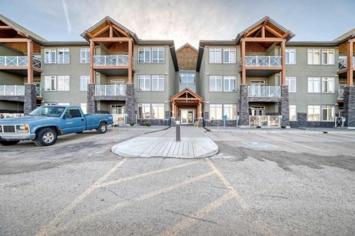 206-1005B Westmount Drive, Strathmore, AB - Outdoor With Balcony With Facade