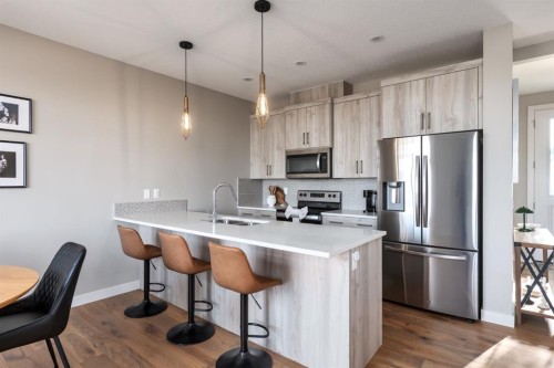848 Marina Drive, Chestermere, AB - Indoor Photo Showing Kitchen With Double Sink