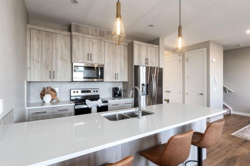 848 Marina Drive, Chestermere, AB - Indoor Photo Showing Kitchen With Double Sink With Upgraded Kitchen