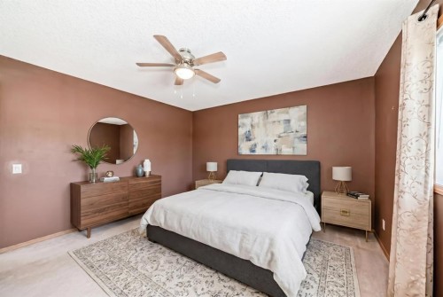 329 Martinwood Place Ne, Calgary, AB - Indoor Photo Showing Bedroom