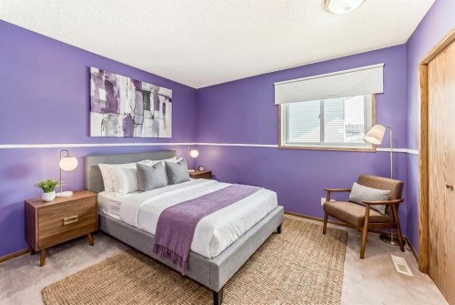 329 Martinwood Place Ne, Calgary, AB - Indoor Photo Showing Bedroom
