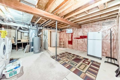 329 Martinwood Place Ne, Calgary, AB - Indoor Photo Showing Basement
