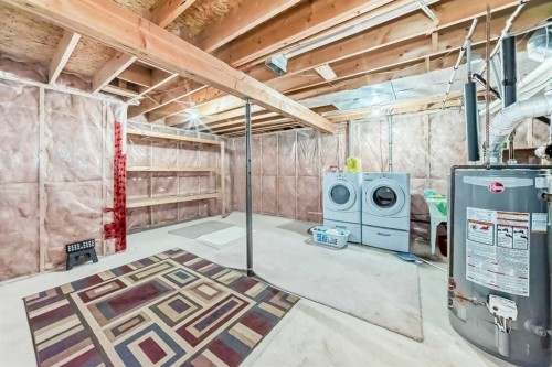 329 Martinwood Place Ne, Calgary, AB - Indoor Photo Showing Basement