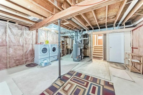 329 Martinwood Place Ne, Calgary, AB - Indoor Photo Showing Basement