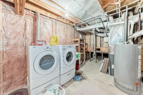 329 Martinwood Place Ne, Calgary, AB - Indoor Photo Showing Laundry Room