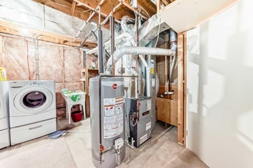 329 Martinwood Place Ne, Calgary, AB - Indoor Photo Showing Laundry Room