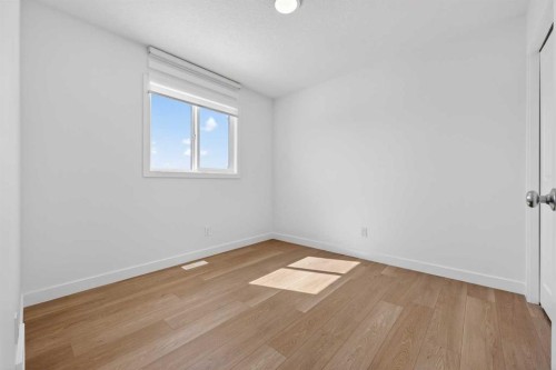 83 Legacy Passage Se, Calgary, AB - Indoor Photo Showing Other Room