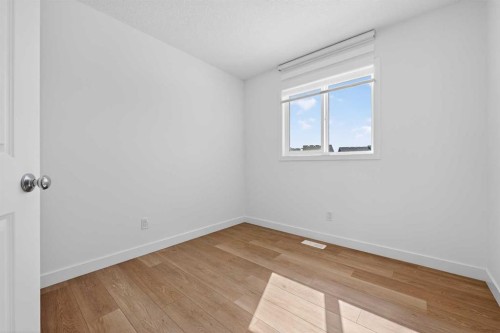 83 Legacy Passage Se, Calgary, AB - Indoor Photo Showing Other Room