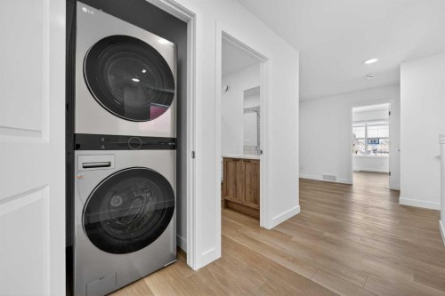 83 Legacy Passage Se, Calgary, AB - Indoor Photo Showing Laundry Room