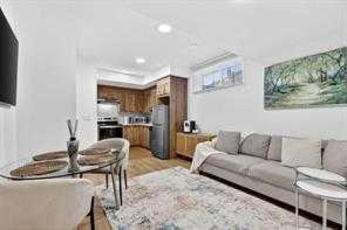 83 Legacy Passage Se, Calgary, AB - Indoor Photo Showing Living Room