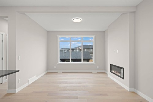 21 Sora Gate Se, Calgary, AB - Indoor With Fireplace