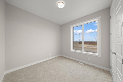 21 Sora Gate Se, Calgary, AB - Indoor Photo Showing Other Room