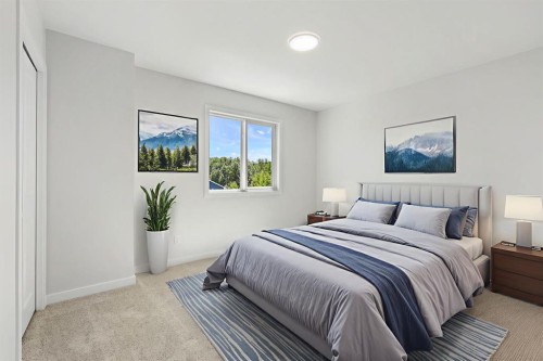9 Park Lane, Didsbury, AB - Indoor Photo Showing Bedroom