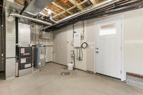 9 Park Lane, Didsbury, AB - Indoor Photo Showing Basement