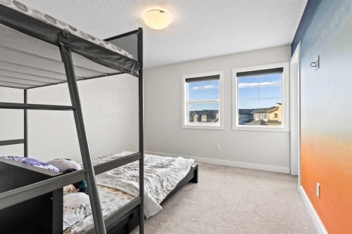 68 Walcrest View Se, Calgary, AB - Indoor Photo Showing Bedroom