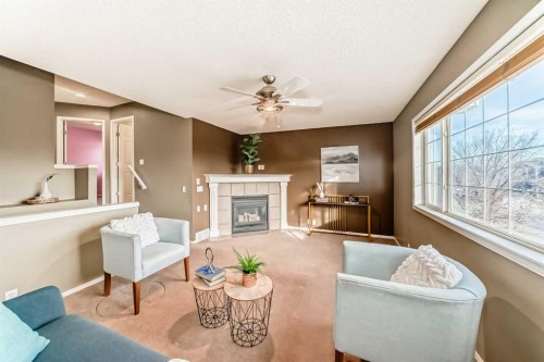 12774 Coventry Hills Way Ne, Calgary, AB - Indoor Photo Showing Living Room With Fireplace
