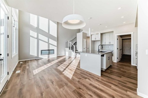 1089 Sawgrass Link Nw, Airdrie, AB - Indoor Photo Showing Kitchen With Upgraded Kitchen