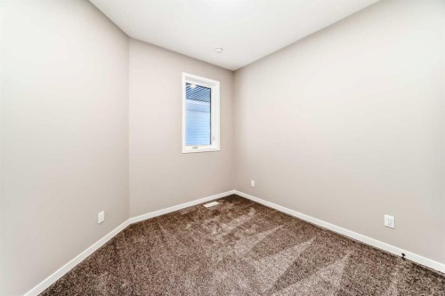 1089 Sawgrass Link Nw, Airdrie, AB - Indoor Photo Showing Other Room