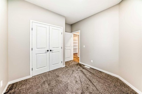 1089 Sawgrass Link Nw, Airdrie, AB - Indoor Photo Showing Other Room