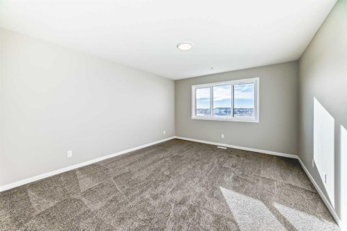1089 Sawgrass Link Nw, Airdrie, AB - Indoor Photo Showing Other Room