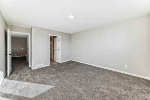 1089 Sawgrass Link Nw, Airdrie, AB - Indoor Photo Showing Other Room