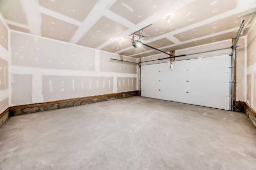 1089 Sawgrass Link Nw, Airdrie, AB - Indoor Photo Showing Garage