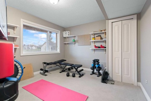 112 Hillcrest Cape, Strathmore, AB - Indoor Photo Showing Gym Room