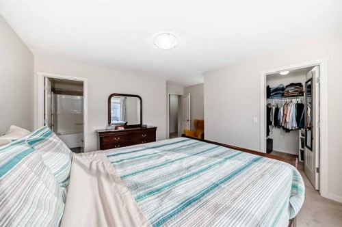 48 Copperpond Landing Se, Calgary, AB - Indoor Photo Showing Bedroom