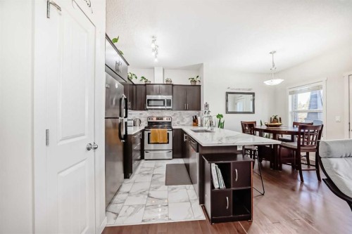 48 Copperpond Landing Se, Calgary, AB - Indoor Photo Showing Kitchen With Upgraded Kitchen