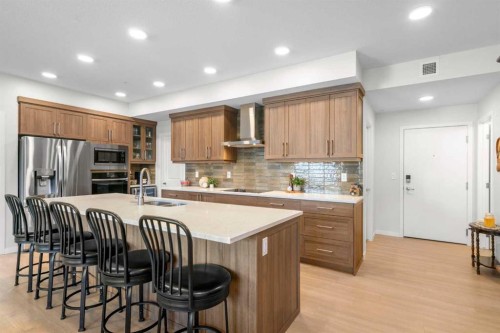 2208-33 Carringham Gate Nw, Calgary, AB - Indoor Photo Showing Kitchen With Double Sink